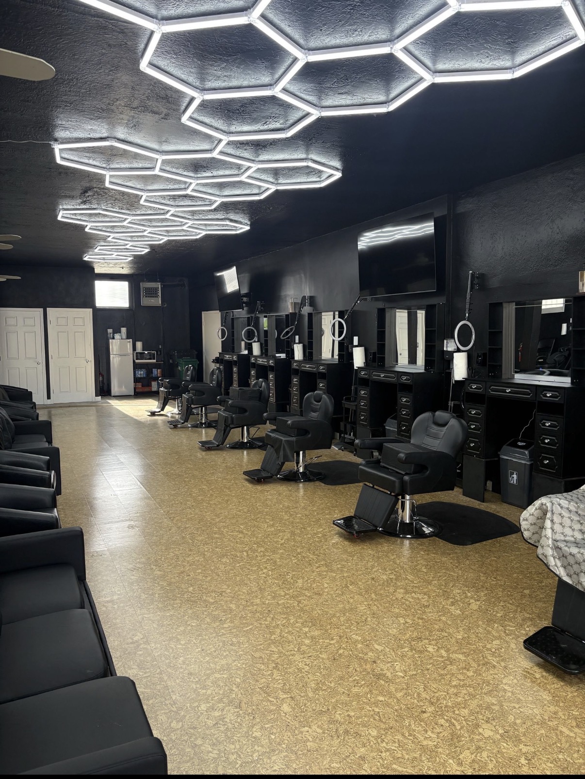 Stations along the back wall of The Parlor