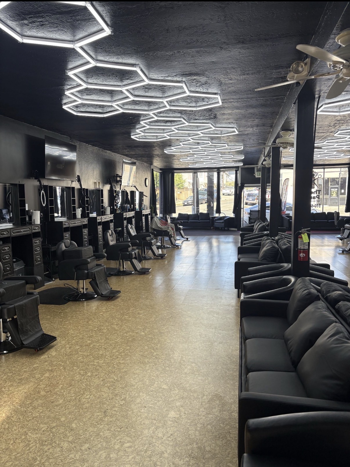 Barber stations under the hexagon ceiling lights