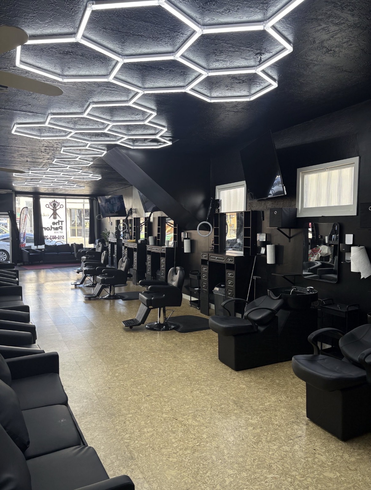 Rows of barber chairs and lounge seating