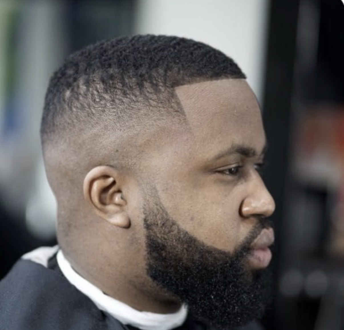 Mid fade with a clean beard lineup