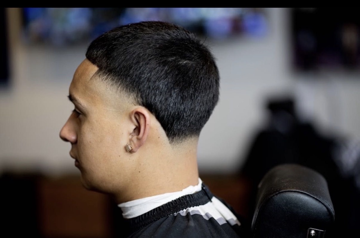 Low taper fade on a textured top